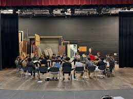 member meet up chairs on stage